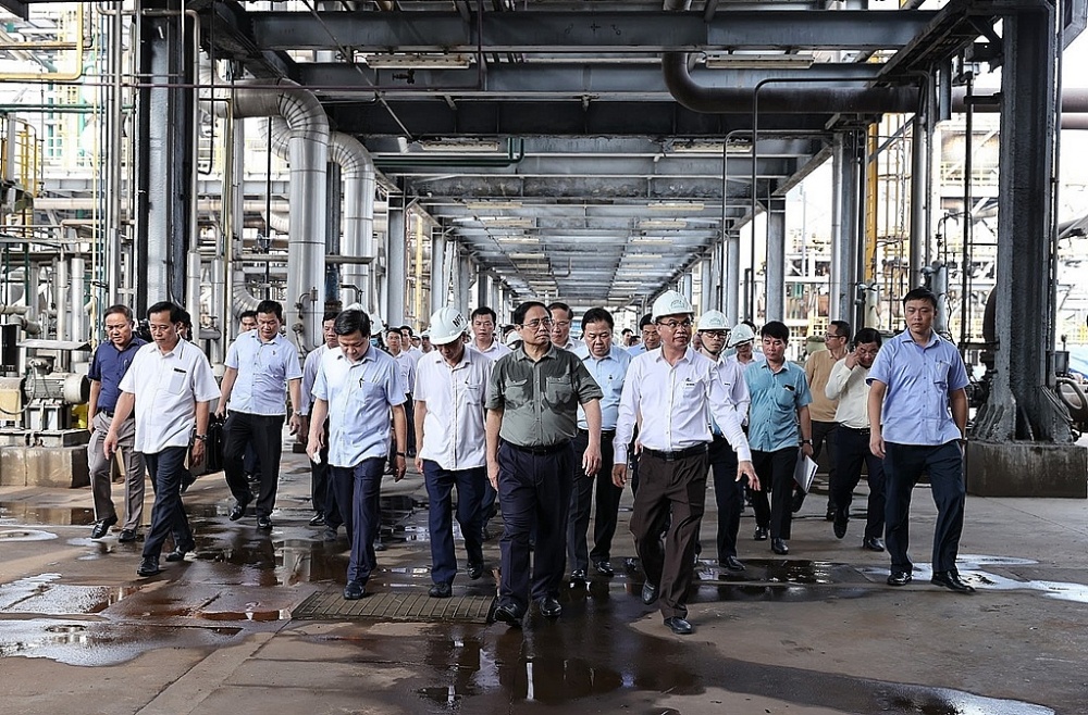 Thủ tướng Phạm Minh Chính cùng lãnh đạo Ủy ban Quản lý vốn nhà nước tại doanh nghiệp đến thăm, kiểm tra hoạt động của nhà máy Đạm Ninh Bình tháng 8/2022.